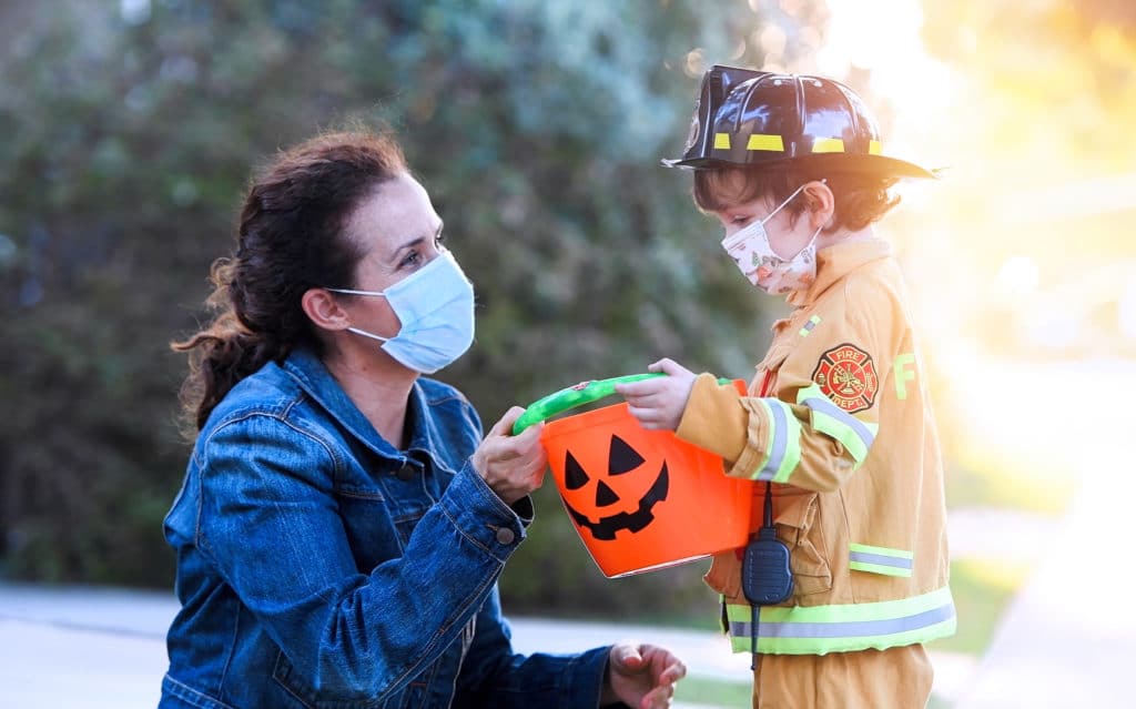 trick-or-treat safety tips for giving out candy safely this halloween