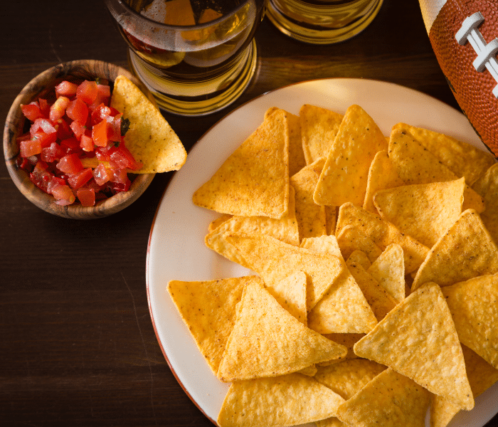 Chips and salsa snack while watching football