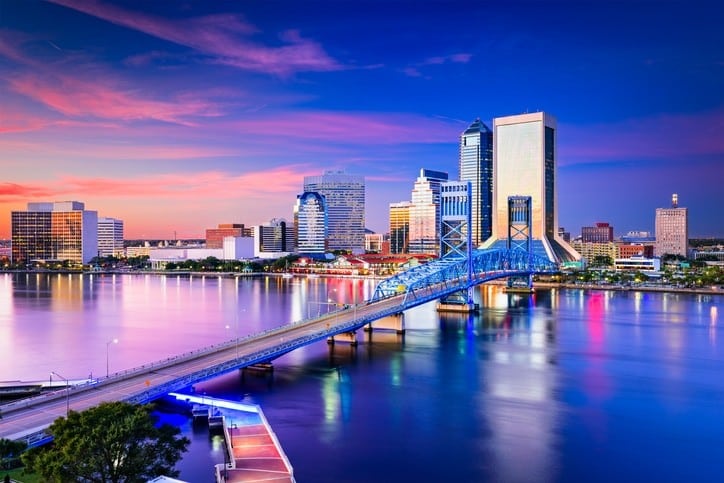 The St. Johns River in the foreground and the Main Street Bridge in Jacksonville, Florida